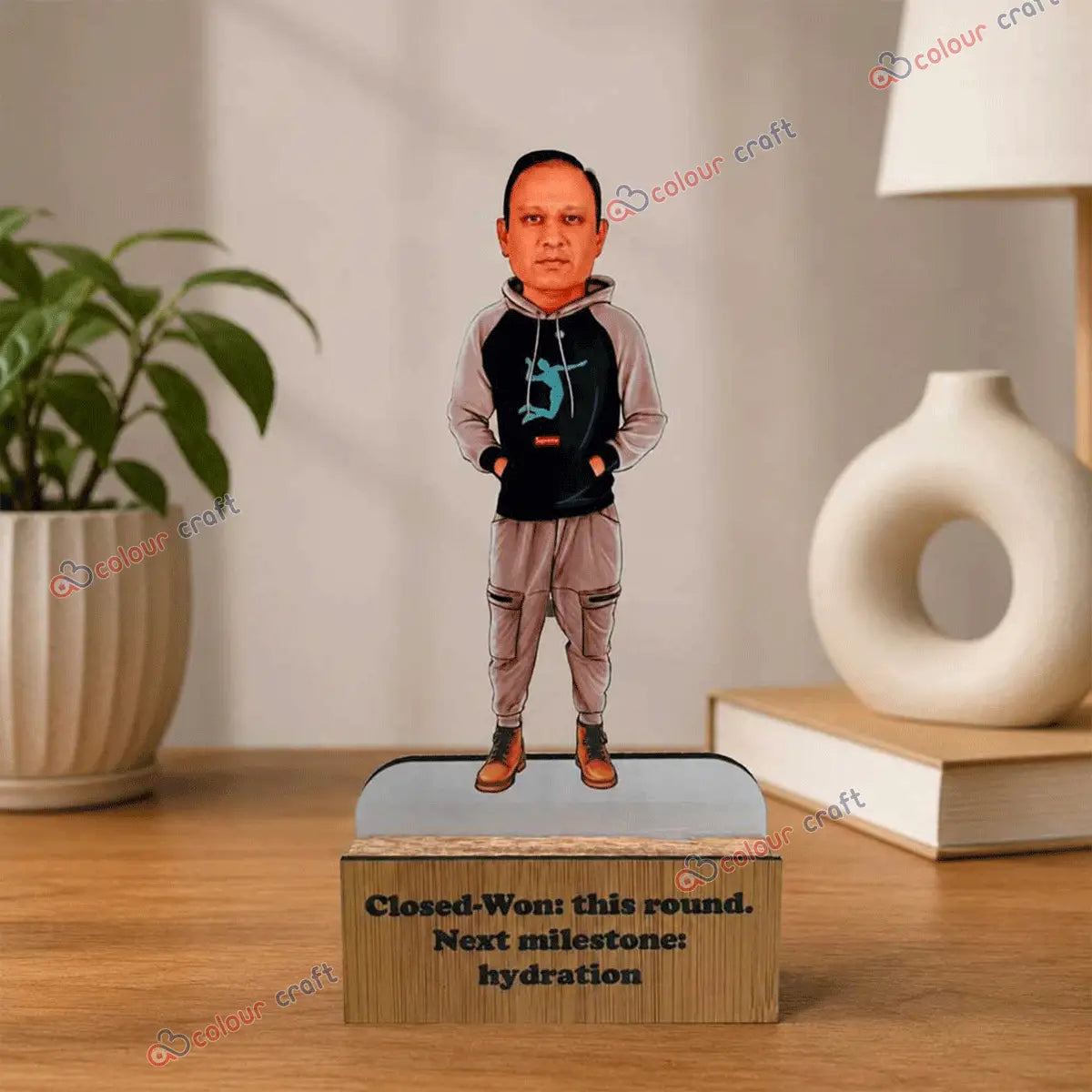 Personalized caricature desk stand with wooden base and custom photo face