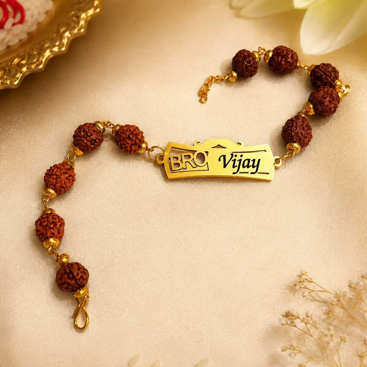 brass rakhi